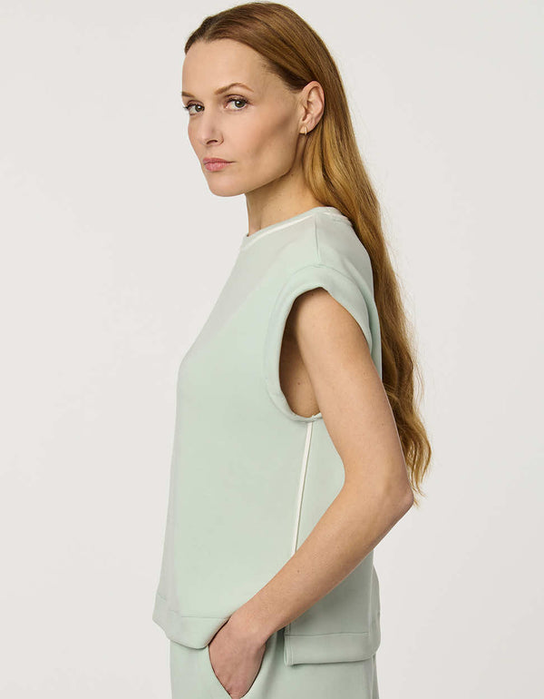 Women’s lightweight scuba tee in Green with cap sleeves and relaxed structured silhouette.