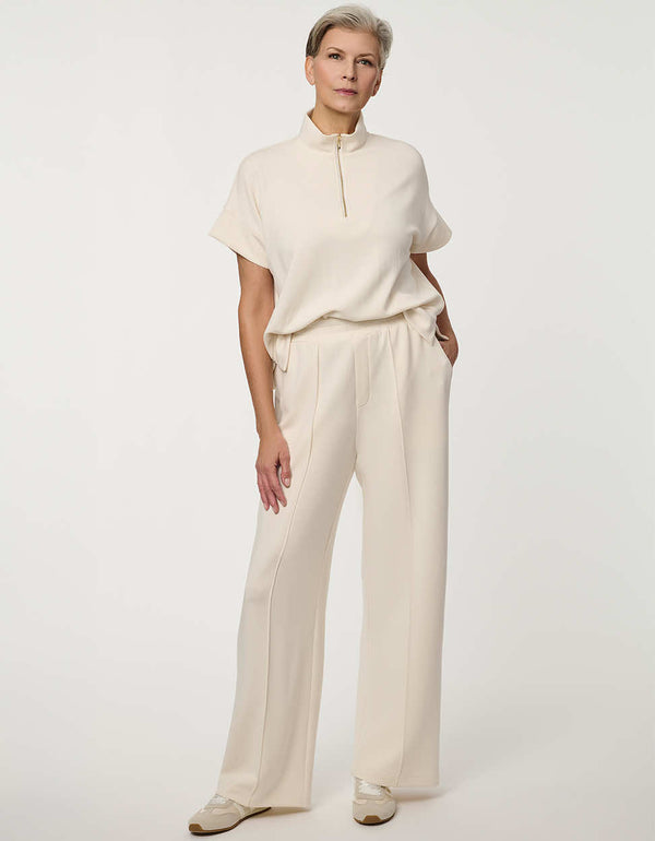 Woman wearing Scuba Pull-On Wide-Leg Pant with elastic waistband and elongated silhouette.