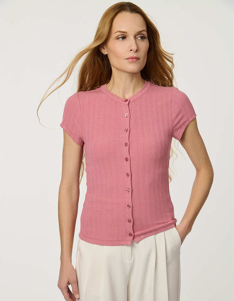 Woman wearing fitted Ribbed Button-Down Tee with short sleeves and full front button closure.