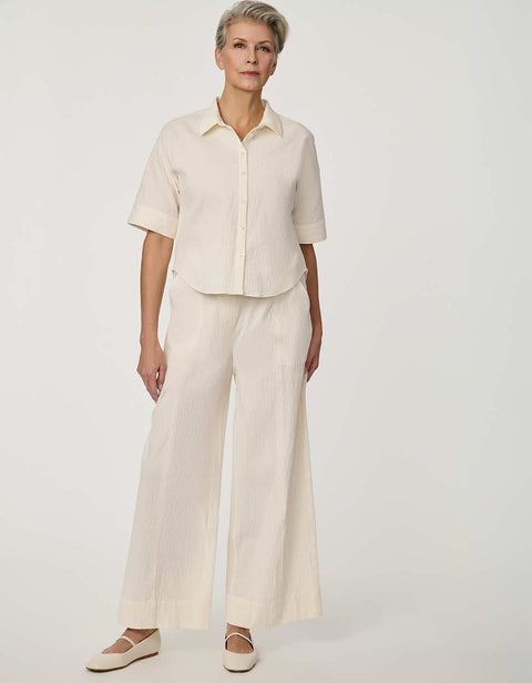 Women’s Gardenia seersucker button-up shirt with short dolman sleeves and relaxed fit.