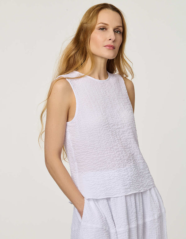 women's white textured sleeveless shell top with matching skirt
