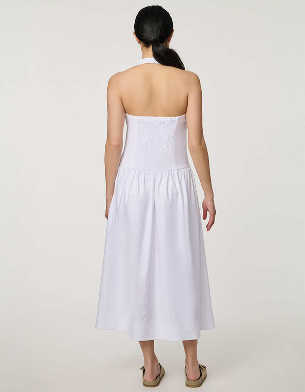 Women’s bright white stretch linen halter midi dress with button front and flowy skirt.