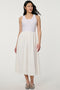 Women’s bright white eyelet midi dress with fitted perforated knit bodice and flowy A-line skirt.