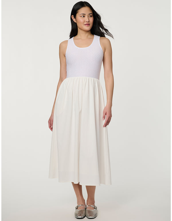 Women’s bright white eyelet midi dress with fitted perforated knit bodice and flowy A-line skirt.
