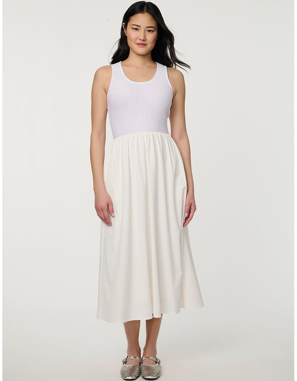 Women’s bright white eyelet midi dress with fitted perforated knit bodice and flowy A-line skirt.