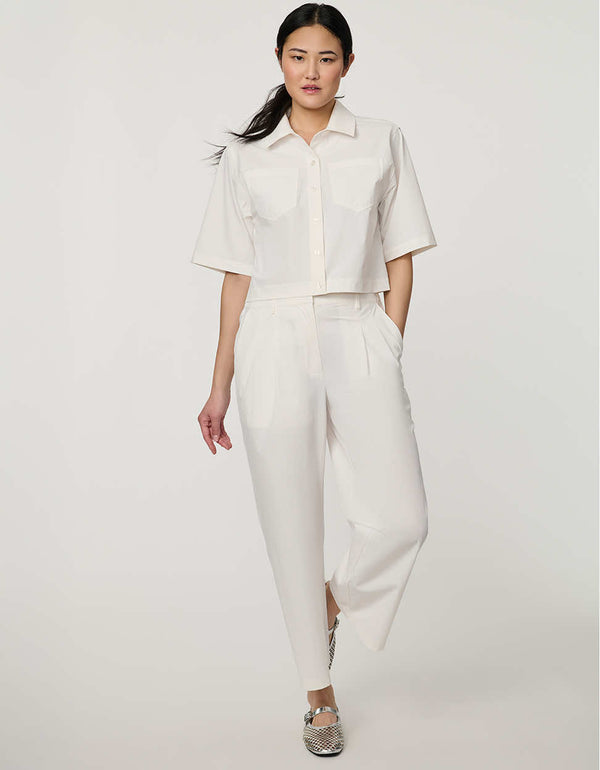 Women’s bright white cropped poplin shirt with short sleeves, button front, patch pockets, and relaxed fit.