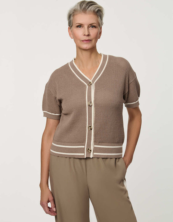 Woman wearing short-sleeve Basketweave Knit Cardigan with textured knit pattern and contrast trim detailing.