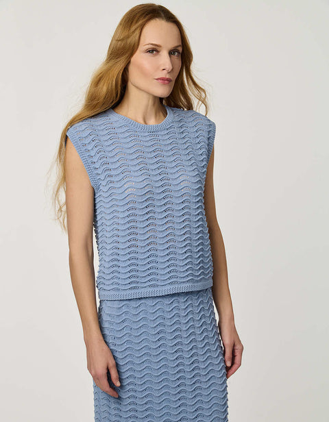 Women’s sleeveless wave knit top in blue with textured open-knit pattern.
