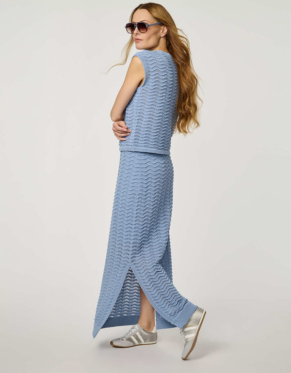 Women’s sleeveless wave knit top in blue with textured open-knit pattern.