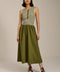Woman wearing striped sleeveless midi dress with knit bodice and full poplin skirt.