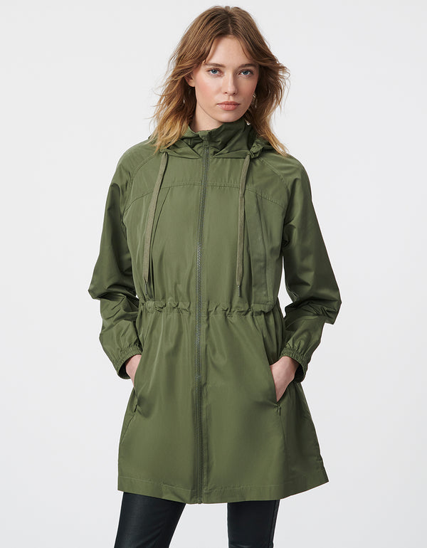 classic fit hooded rain jacket in green ideal for women on the move in the city
