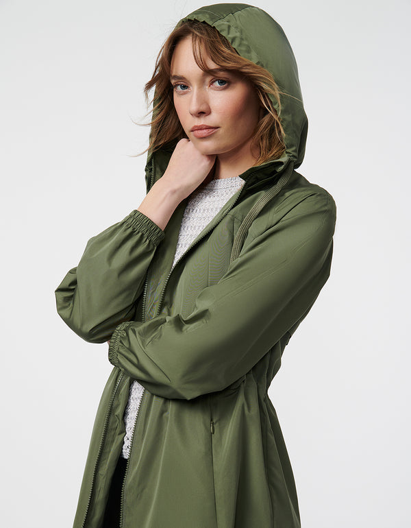 eco friendly hooded wind and rain jacket for women designed for city adventures