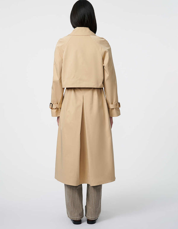 sustainable hip length trench coat for modern women crafted in classic fit with belt