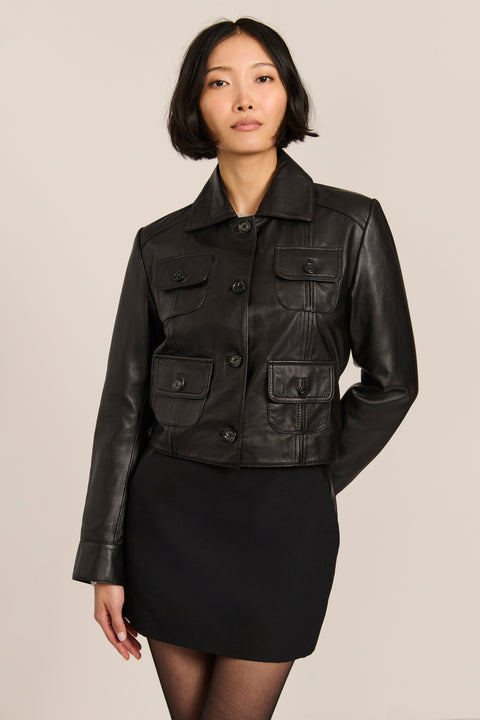 Women's genuine leather utility jacket with button-front closure and four flap pockets