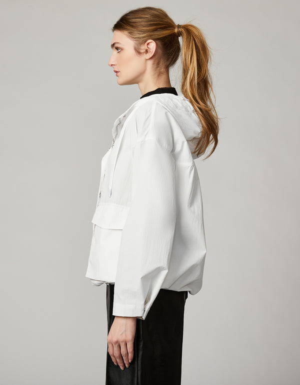 boxy white windbreaker crafted from eco friendly recycled nylon for urban wear