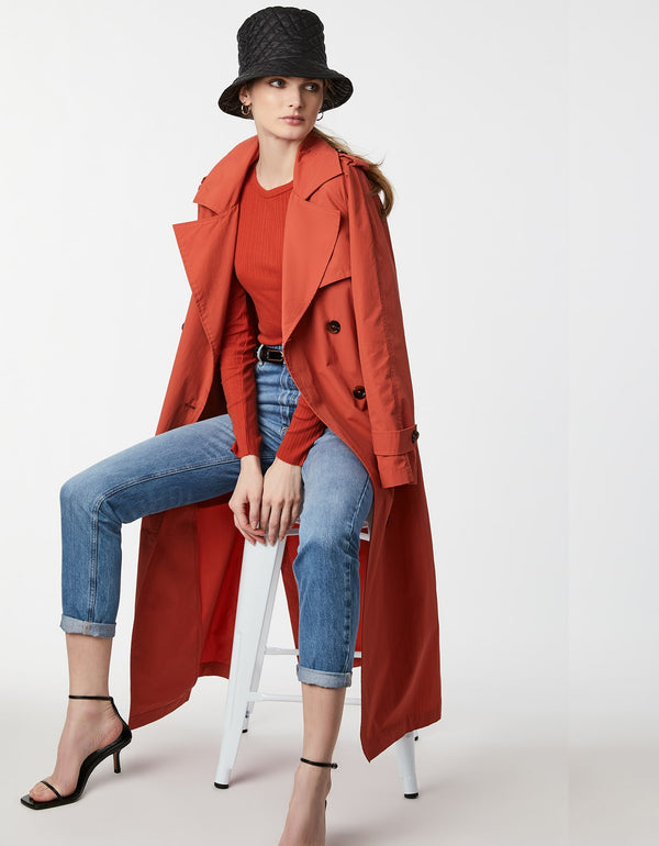 long trench coat for women in lightweight classic fit in a unique pink orange feminine color below knee length from environmentally friendly brand Bernardo