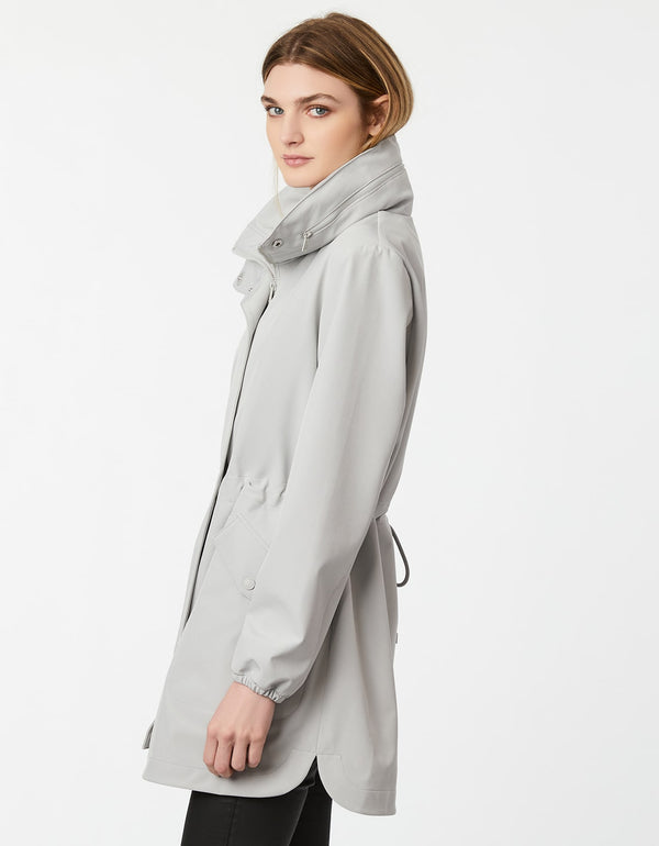 enjoy custom fit and protection in this classic pearl grey raincoat with drawstring details
