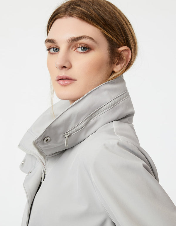 beautifully lined pearl grey raincoat with drawstring waist and signature details