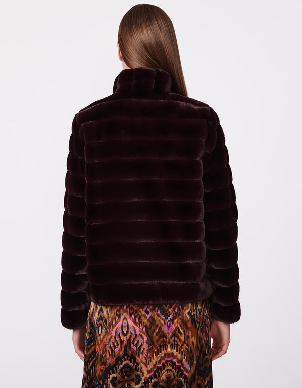 cruelty free luxury brand Bernardo Fashions stocks this vegan faux fur coat in red as womens outerwear