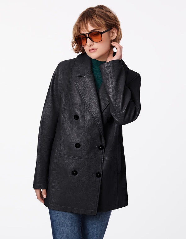 black style blazer with a classic structured style as womens outerwear during fall and spring