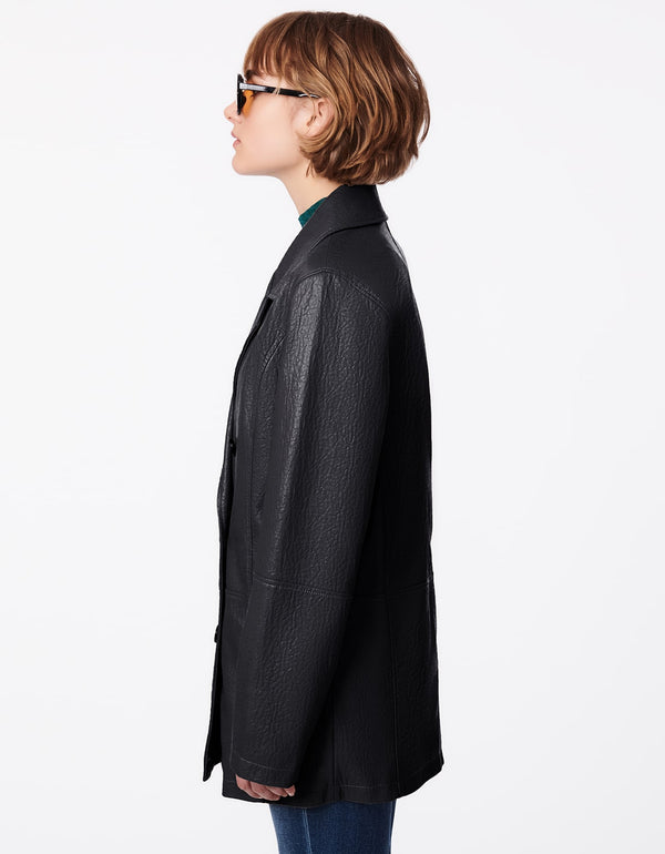 oversized blazer jacket with double breasted silhouette and overlapping notched lapel