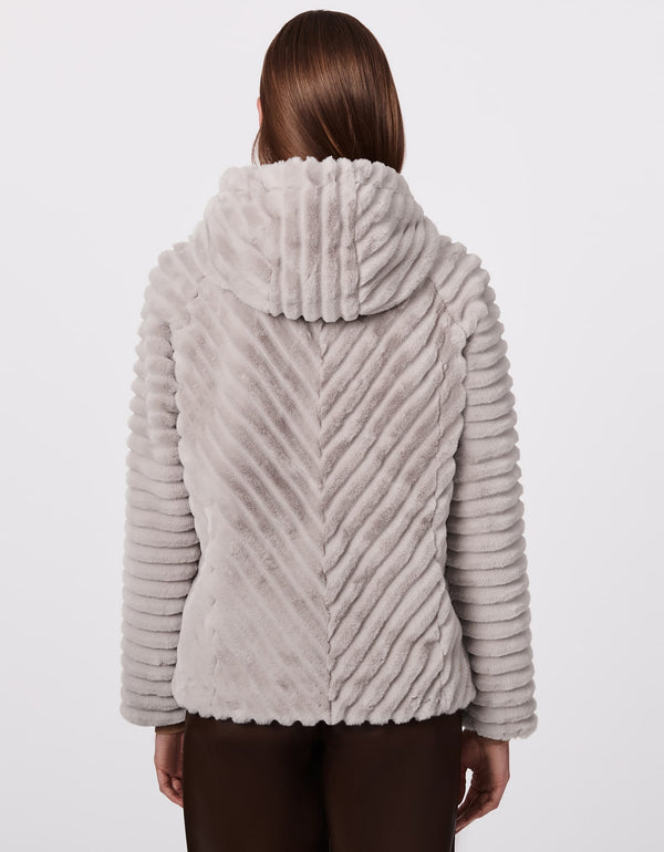 cool urbanwear jackets for women during winter comes in this vegan fur jacket with hood in light gray color