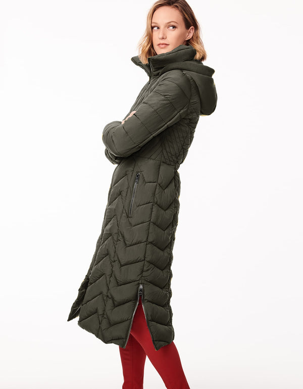 semi fitted below the knee length womens long puffer coat in green for heavy winter with non bulky filler and removable hood