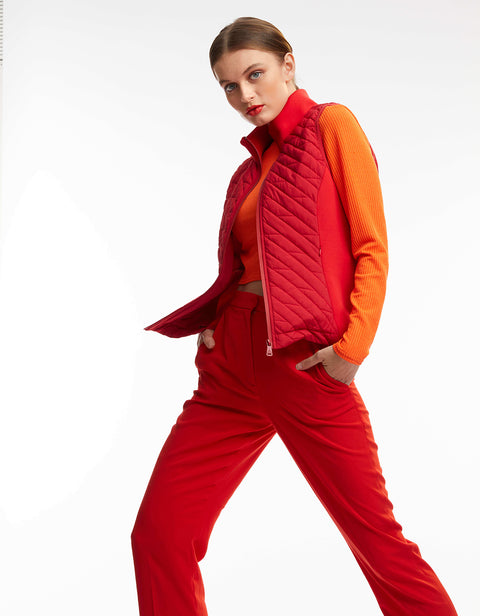 womens waterproof and windproof puffer vest that is lightweight and layerable perfect for multi season wear