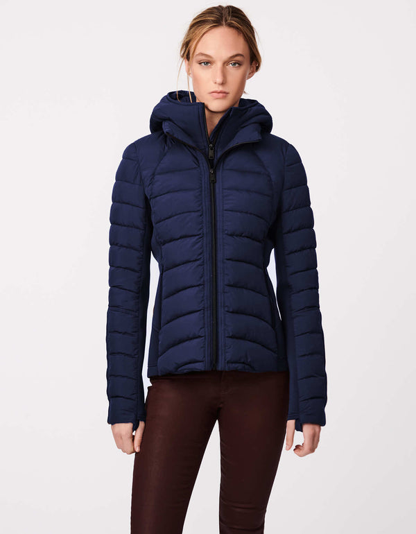 sustainable womens clothing slim fit hip length packable slim fit double up hooded puffer in medium dark shade of blue