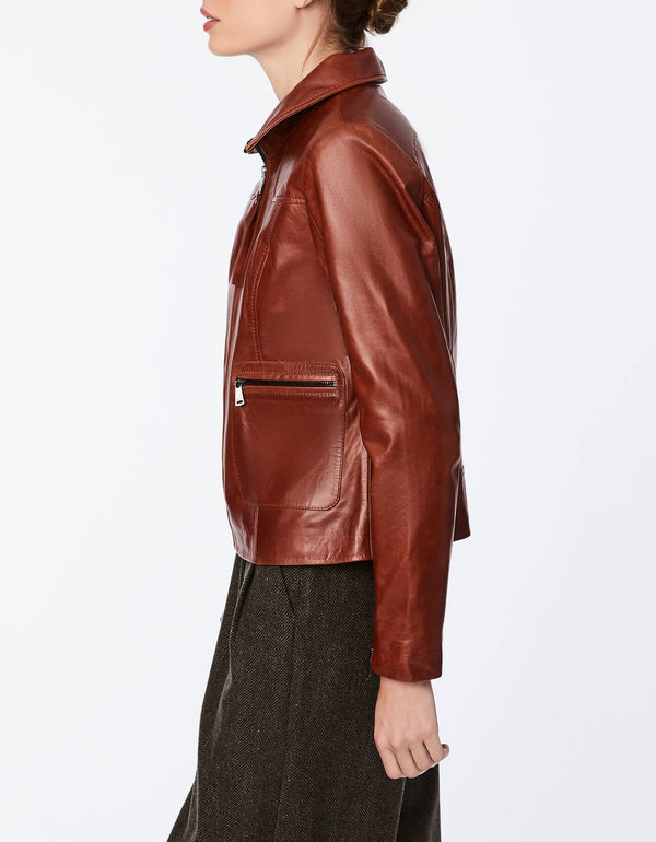 winter wear brown leather jacket with classic fit that is hip length made from genuine leather material