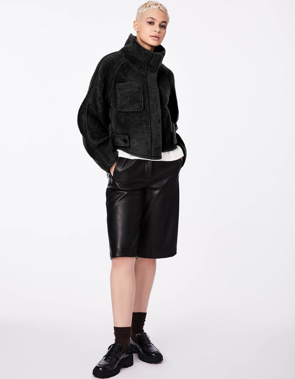 womens relaxed cropped jacket in a black cropped length design and chest patch pocket