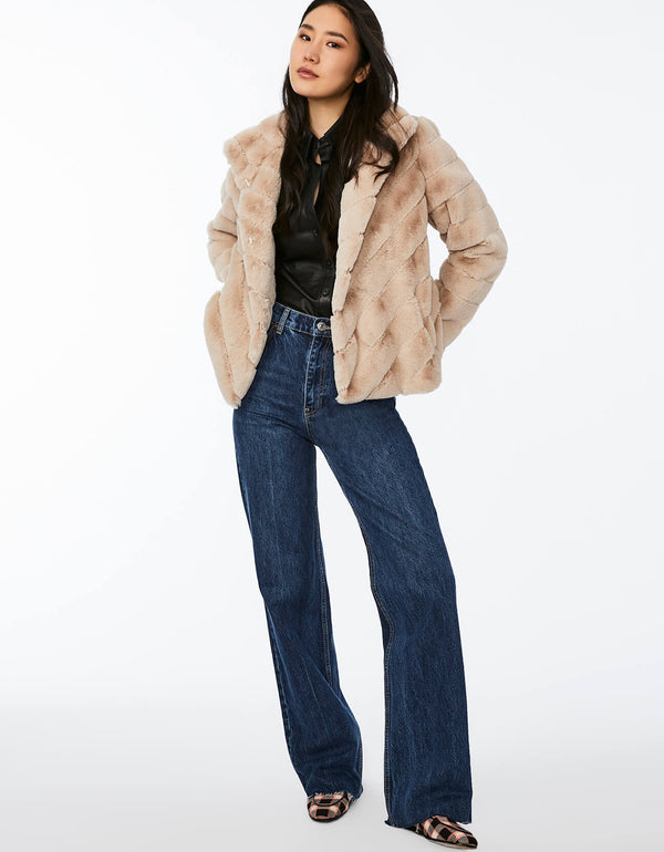 womens faux fur jacket in taupe that is short chic and sumptuously sheared for fall and winter collection 2023