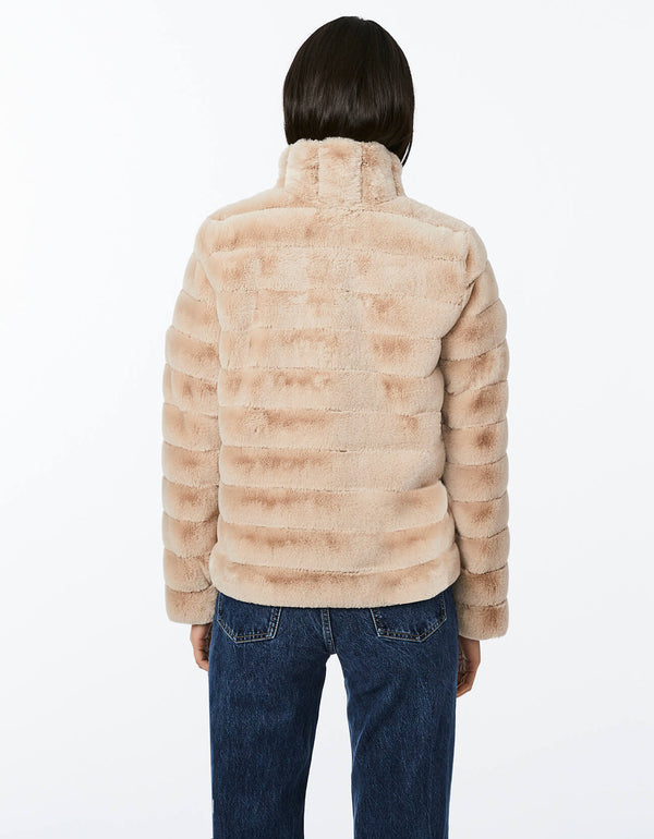 unreal fur jacket in light brown color with face framing stand collar off center hook front and sectioned stitching