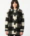 cozy and warm button up knitted black and white checkered shirt with two front pockets for women
