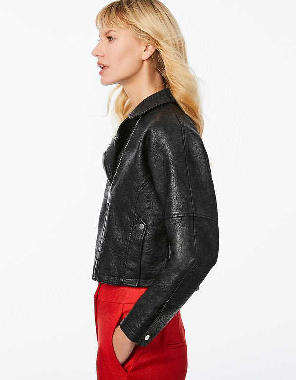 cropped leather jacket in black that is machine wash friendly and is made from polyurethane and polyester