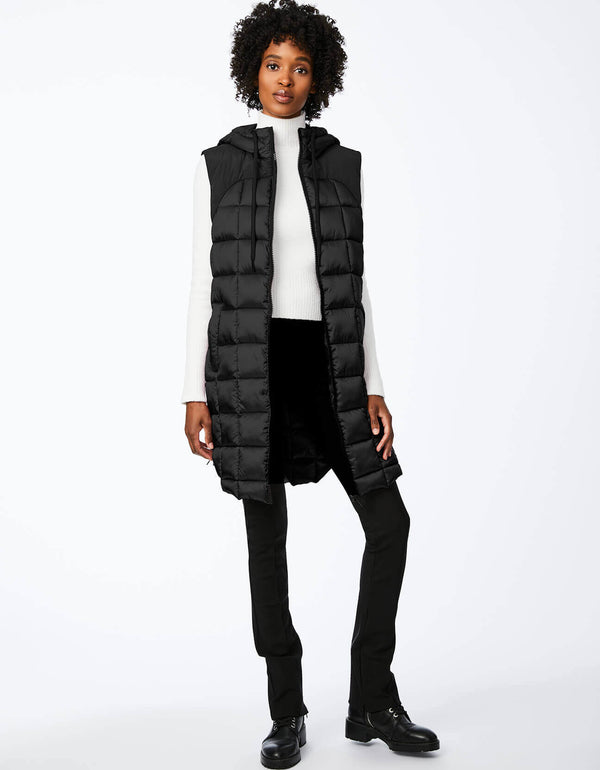easy to pack and non bulky hooded puffer vest for women in black with slit pockets for a warm spring and fall