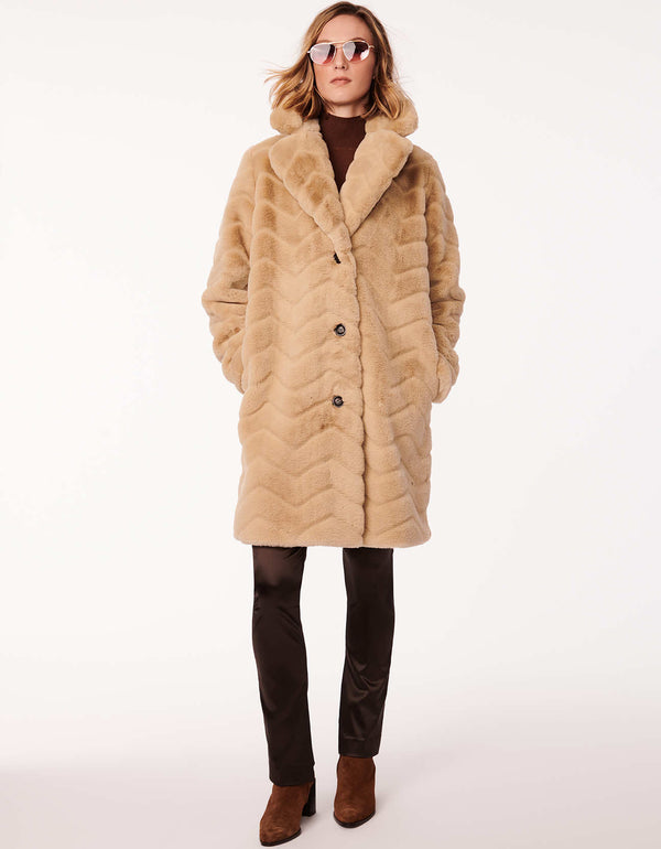 womens fashion coat with vegan fur accented with slanted hand pockets