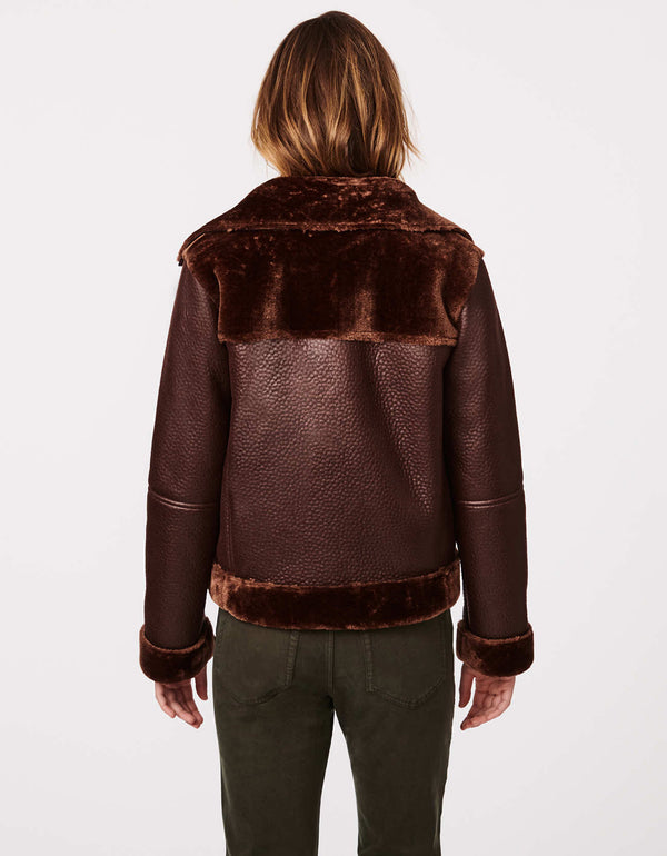 cruelty free luxury brand Bernardo Fashions offer winter clothes for women vegan fur and vegan leather jacket in brown