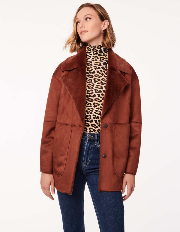womens outerwear for fall is this ginger red orange color jacket with vegan shearling in classic fit up to the hip length jacket