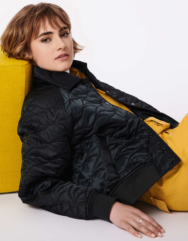 hip and stylish womens puffer jacket with intricate quilting in black in hip length classic fitted style