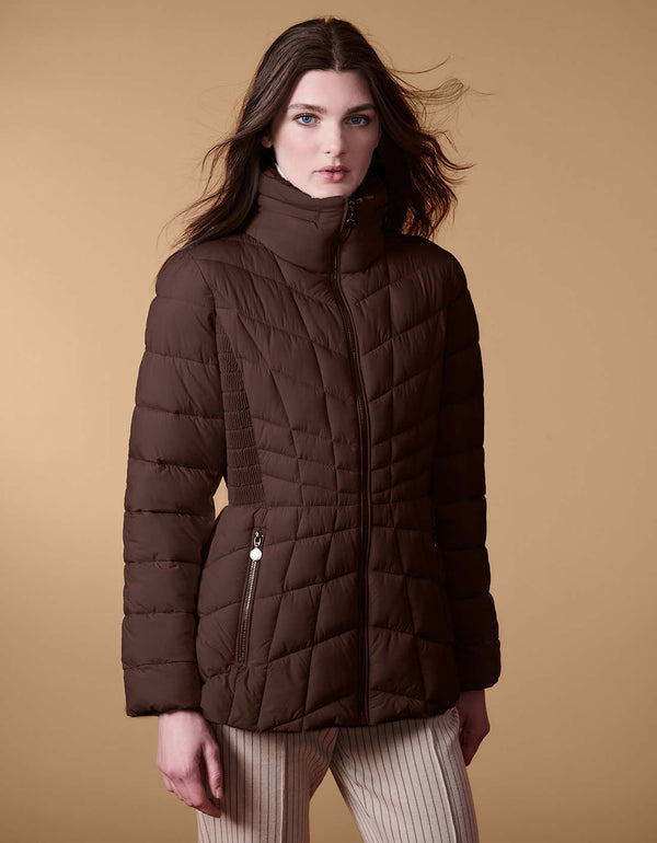 semi fitted puffer jacket for women in dark brown with flared silhouette to help draw eyes away from the waist