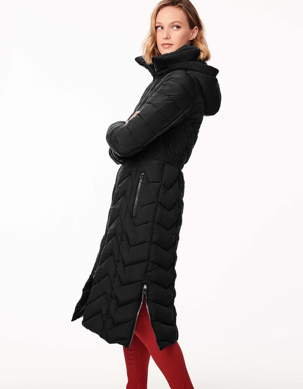 stylish long puffer coat in black for heavy winter in the US with non bulky filler and removable hood