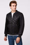 stay warm in a quilted mens puffer jacket for winter in black with EcoPlume insulation made by a sustainable outerwear brand