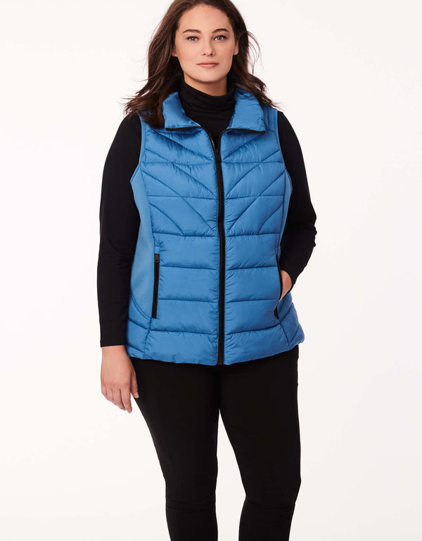 transitional vest for plus sized women in blue color designed for a fashionable fall outerwear