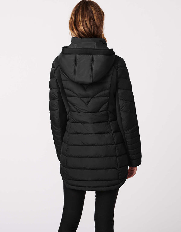 black winter jacket that can be a walker coat or performance puffer that is easy to store and wash