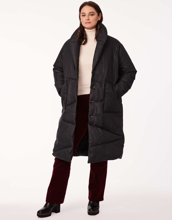 non bulky below knee length long puffer coat for plus sized women with a belt to emphasize waist