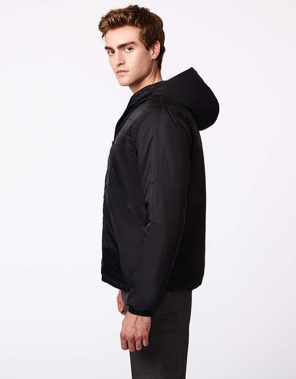 mens outerwear for fall and winter: puffer jacket with zipper styling two chest pockets and two hand pockets in black