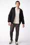 warm winter coats for men are here in a black puffer jacket made with EcoPlume insulation and 4 zipper pockets