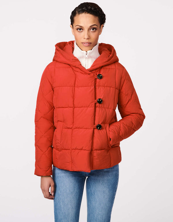 womens hooded puffy jacket that is cruelty free and is warm and water resistant perfect for chilly weather