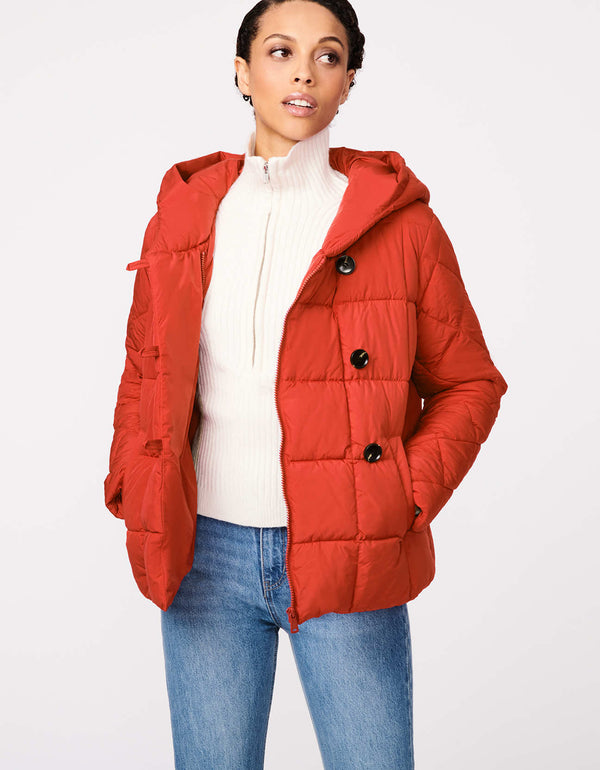 non bulk slim fit hip length padded jacket in red orange color that is made from post consumer plastic bottles